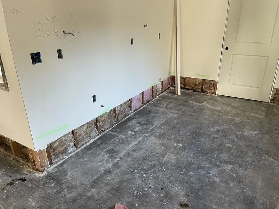 Flood-cut walls opened to dry the cavity in a San Marino, CA home